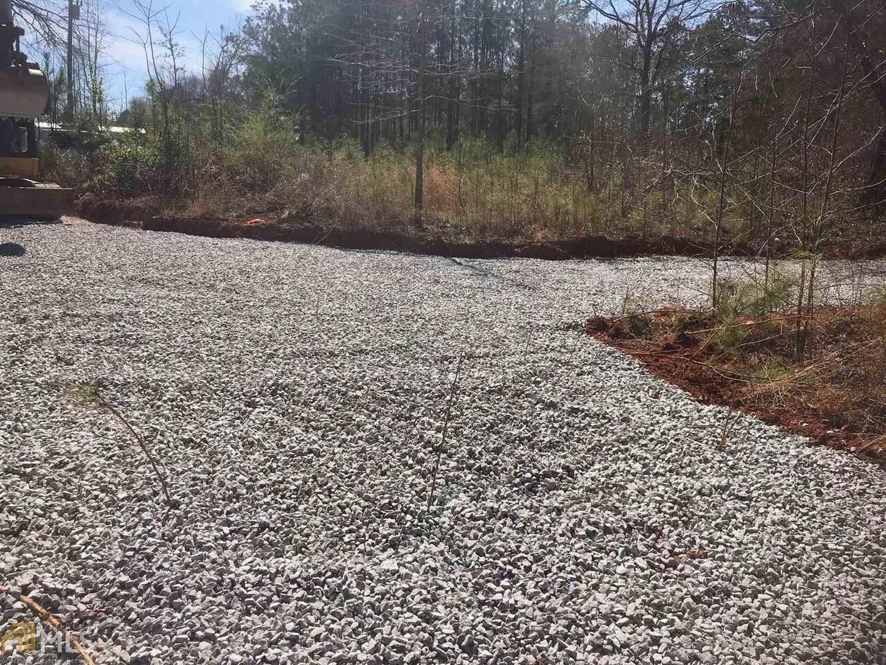 230 Simms Road Carrollton, GA 30117 - Photo 1 of 1 a view of a pathway of a yard