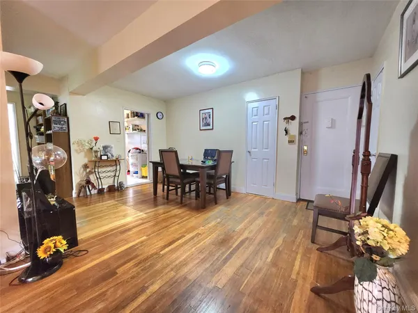 a view of a livingroom with furniture and a flat screen tv