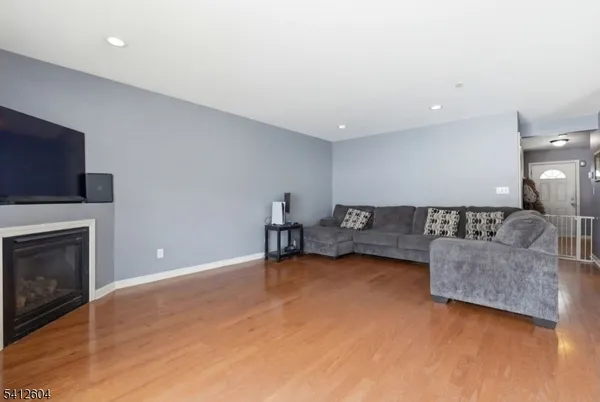 a view of livingroom with furniture and fireplace