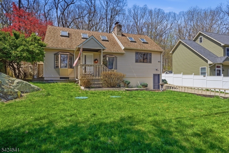 7 Pathfinder Trail Wharton, NJ 07885 - Photo 2 of 46 a front view of a house with a yard