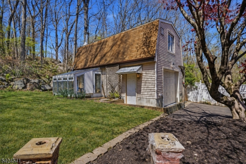 7 Pathfinder Trail Wharton, NJ 07885 - Photo 34 of 46 a front view of a house with a garden