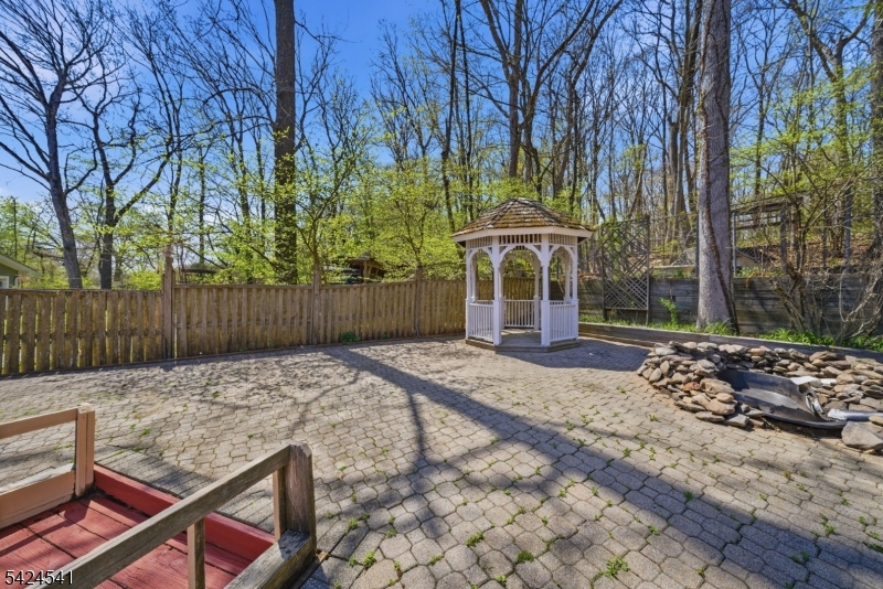 7 Pathfinder Trail Wharton, NJ 07885 - Photo 39 of 46 a view of a backyard with a tree