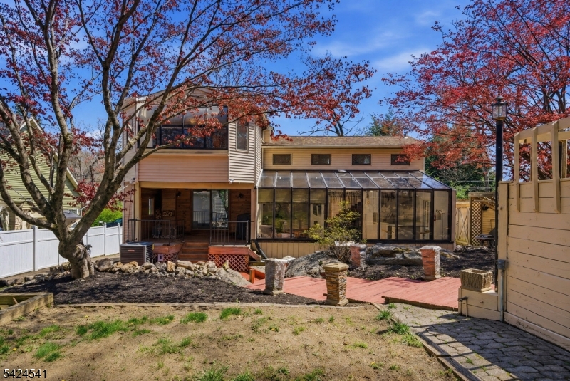 7 Pathfinder Trail Wharton, NJ 07885 - Photo 41 of 46 a view of a house with backyard and sitting area