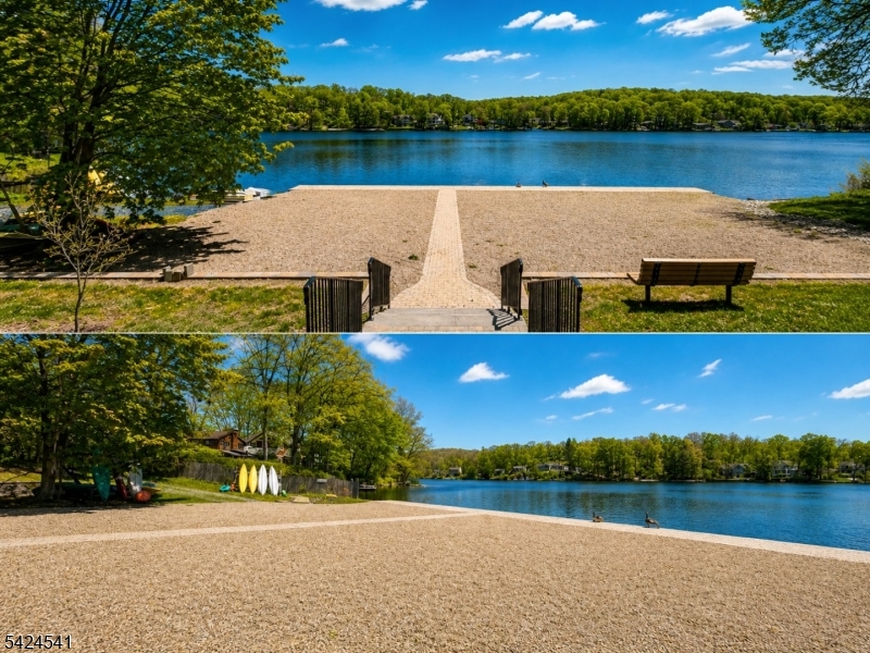 7 Pathfinder Trail Wharton, NJ 07885 - Photo 45 of 46 a view of a lake with houses in the back