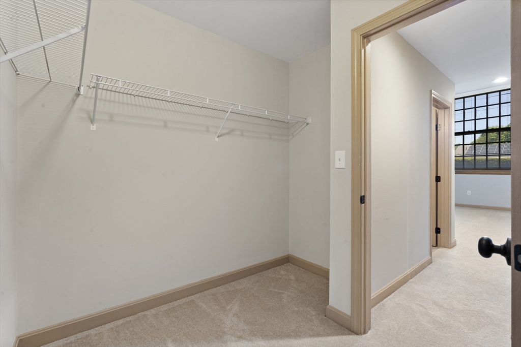 550 Washington Street, Unit 210 Braintree, MA 02184 - Photo 5 of 6 a view of an empty room