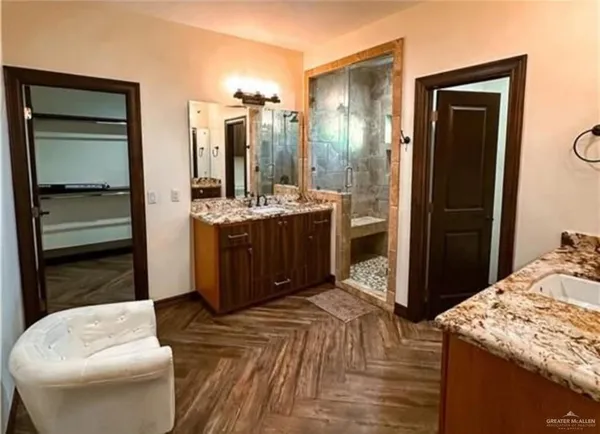 a kitchen with a stove and a refrigerator