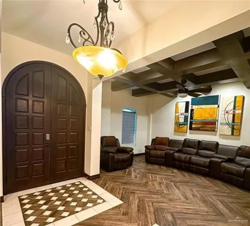 a living room with furniture and a rug