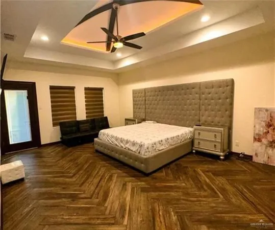 a bedroom with a bed and a walk in closet