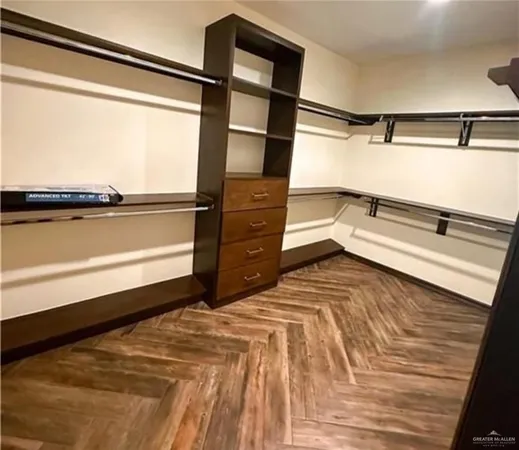 a bedroom with a bed and a window view