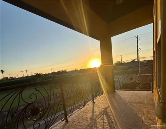 a view of a balcony with ocean view