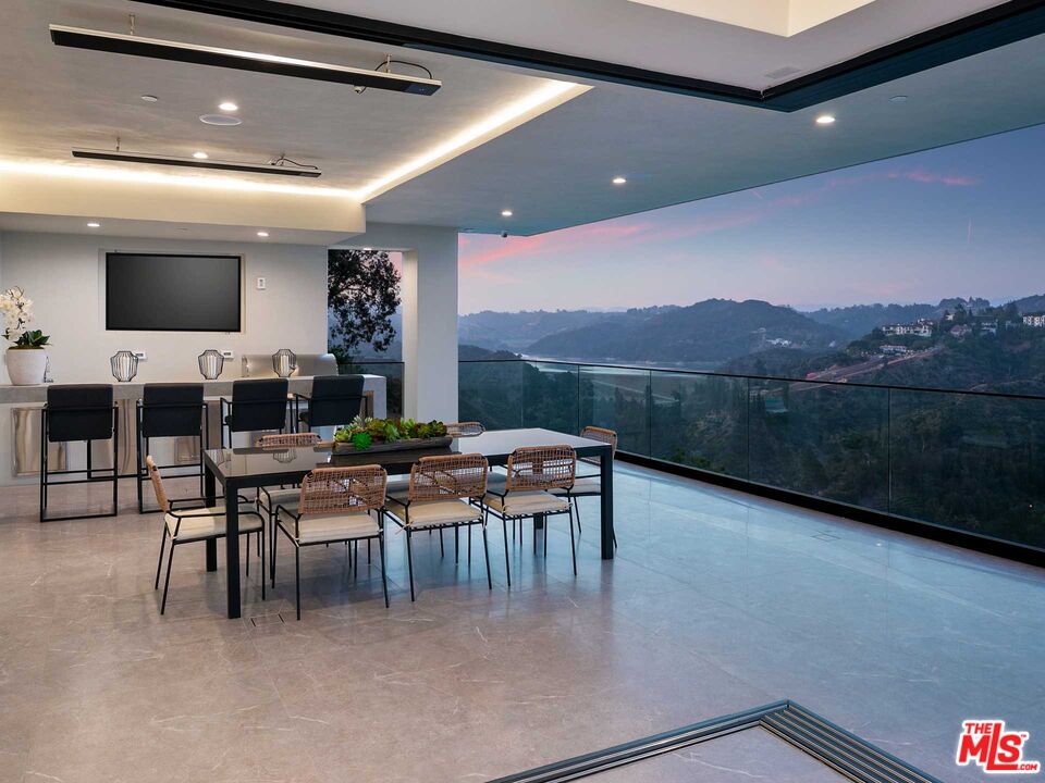1324 Stradella Road Los Angeles, CA 90077 - Photo 25 of 26 a view of a livingroom with furniture window and outside view