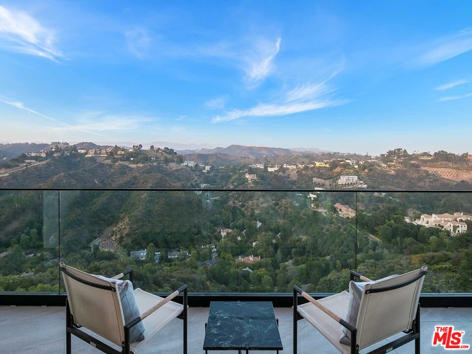 1324 Stradella Road Los Angeles, CA 90077 - Photo 8 of 26 an outdoor view of lake with green space