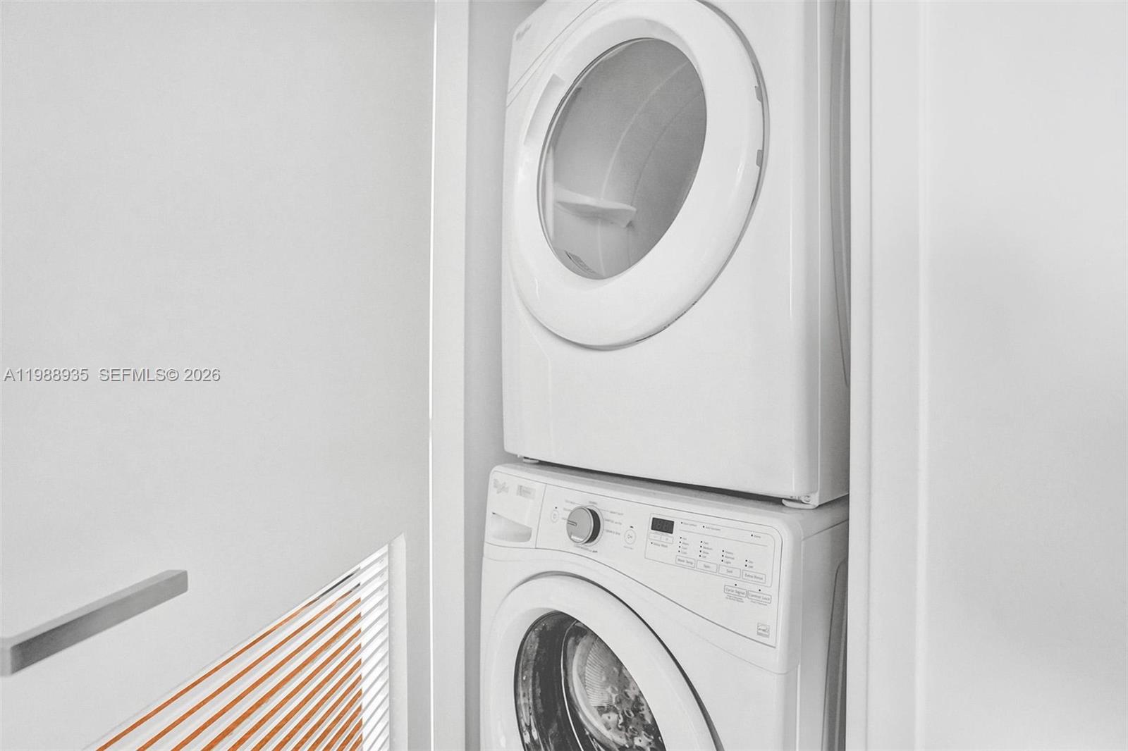 401 North Birch Road, Unit 513 Fort Lauderdale, FL 33304 - Photo 13 of 37 a close up view of a washer and dryer