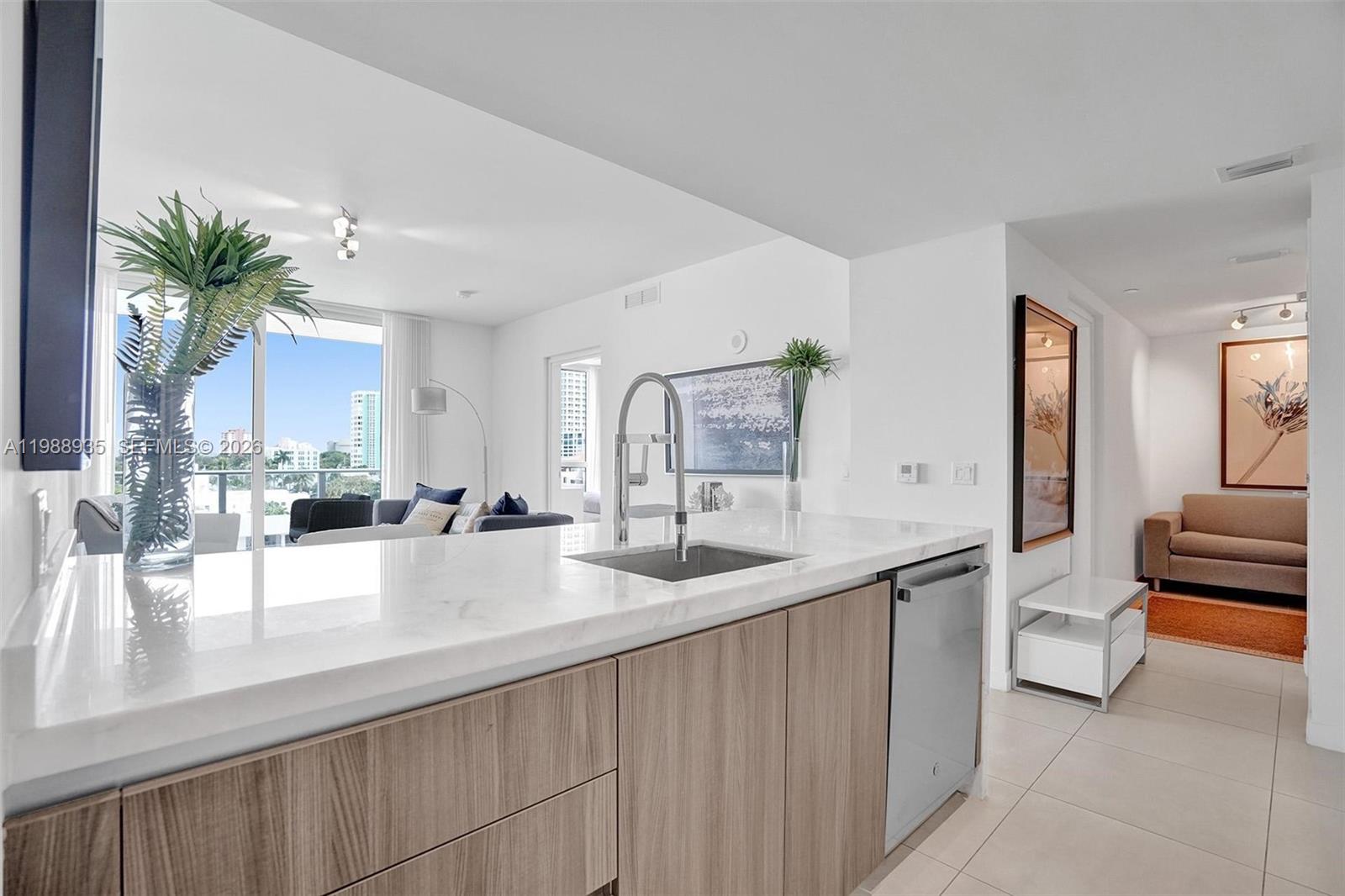 401 North Birch Road, Unit 513 Fort Lauderdale, FL 33304 - Photo 18 of 37 a view of a living room and dining room