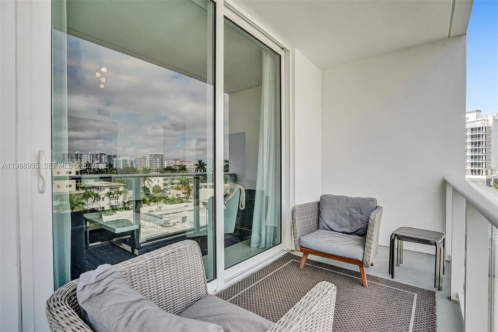 401 North Birch Road, Unit 513 Fort Lauderdale, FL 33304 - Photo 35 of 37 a living room with furniture