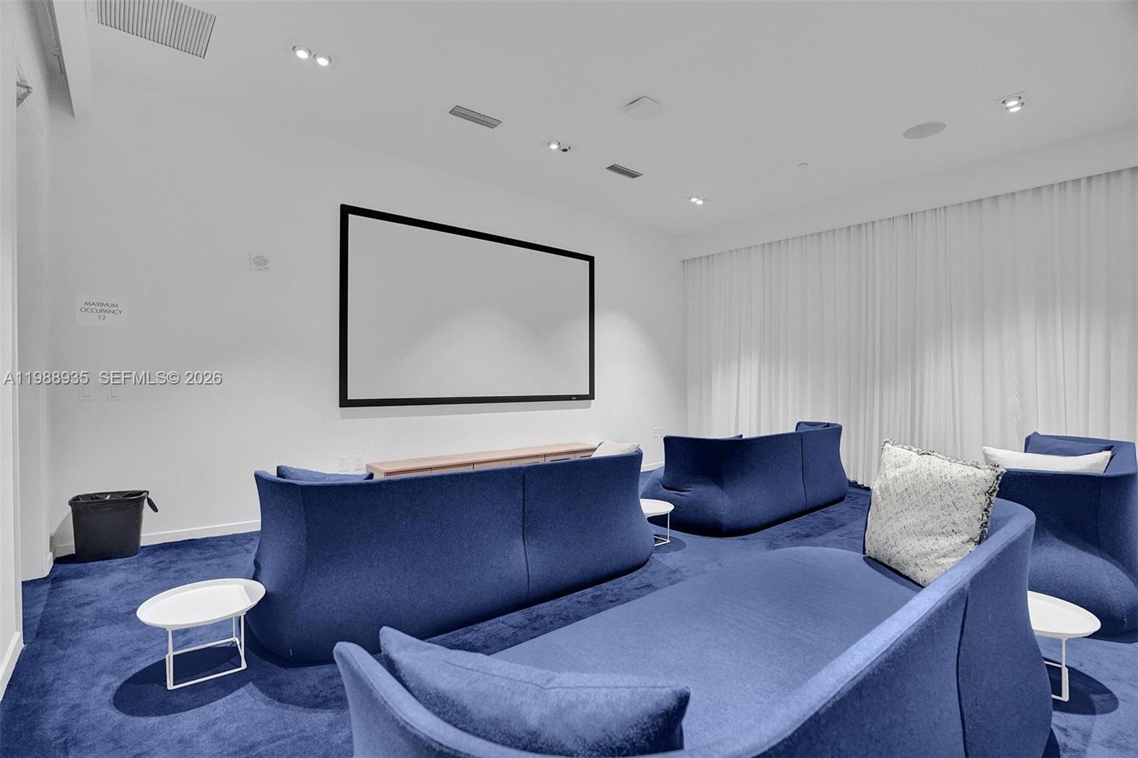 401 North Birch Road, Unit 513 Fort Lauderdale, FL 33304 - Photo 36 of 37 a room with furniture and a chair