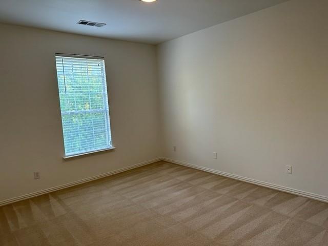 4202 Merrell Road Dallas, TX 75229 - Photo 14 of 16 an empty room with a window