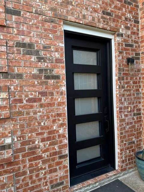 4202 Merrell Road Dallas, TX 75229 - Photo 2 of 16 a building with a door