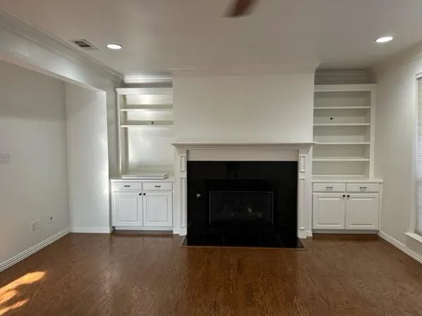 a room with fireplace and a window