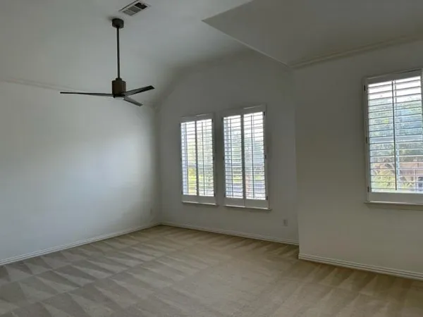 an empty room with windows