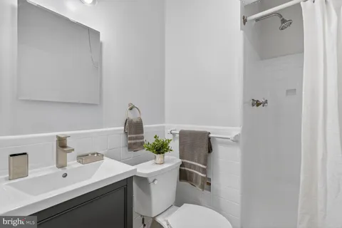 a bathroom with a sink and a toilet
