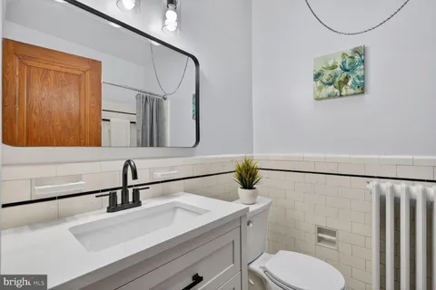 a bathroom with a sink and a toilet