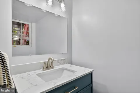 a bathroom with a sink and a bathtub