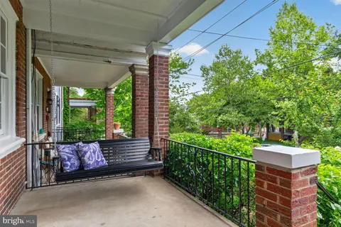 a view of a bench in the porch