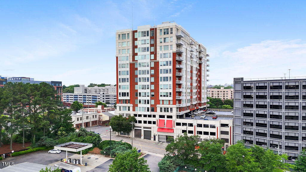 400 West North Street, Unit 604 Raleigh, NC 27603 - Photo 2 of 46 a view of a building with streets and trees