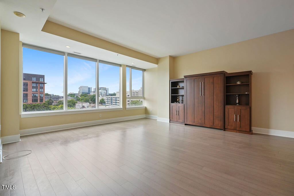 400 West North Street, Unit 604 Raleigh, NC 27603 - Photo 22 of 46 a view of an empty room with a window