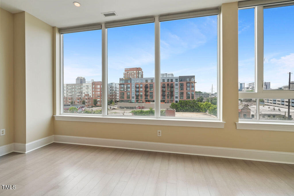 400 West North Street, Unit 604 Raleigh, NC 27603 - Photo 23 of 46 a view of an empty room with a window