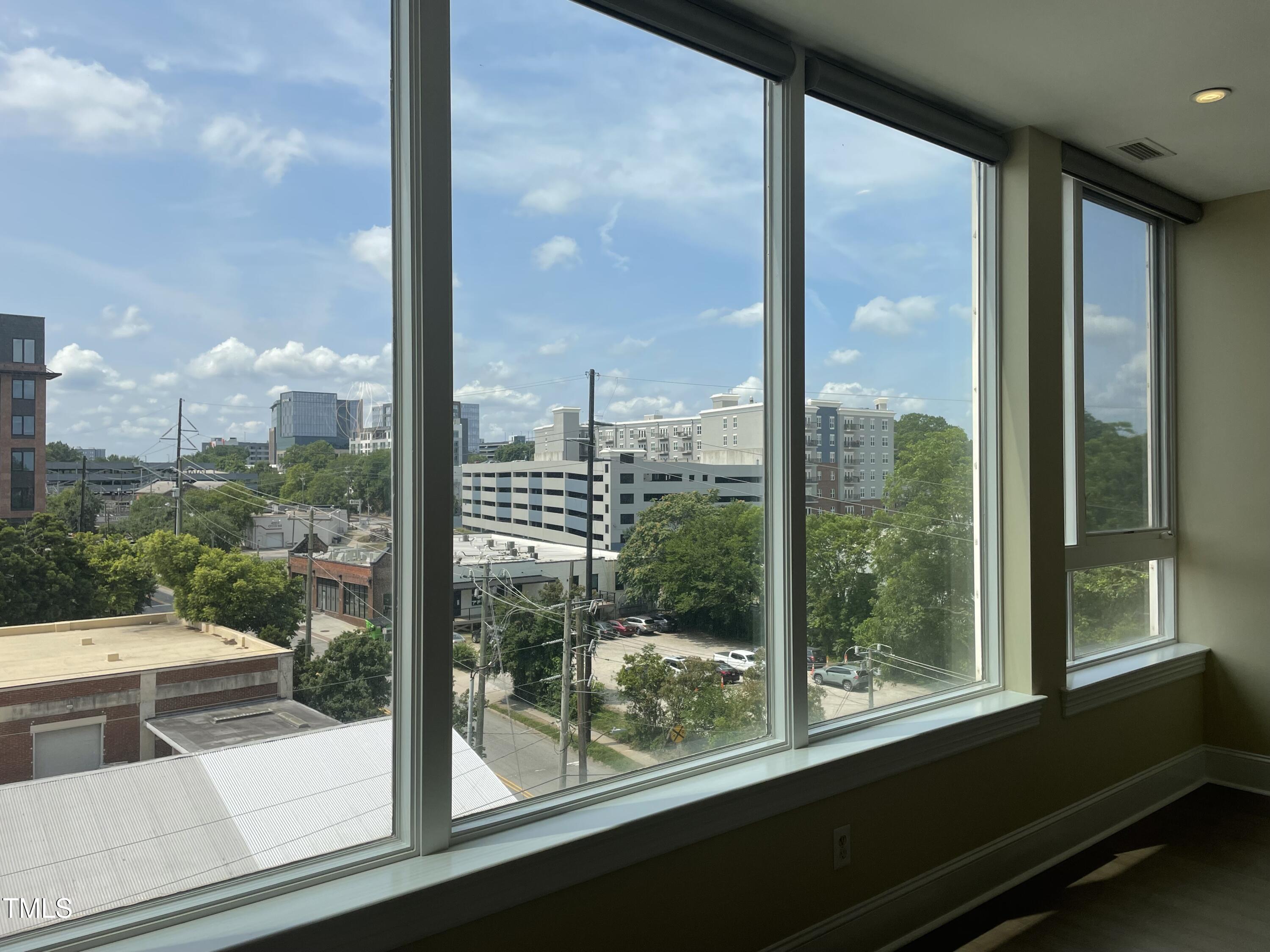 400 West North Street, Unit 604 Raleigh, NC 27603 - Photo 28 of 46 a view of a city from a window