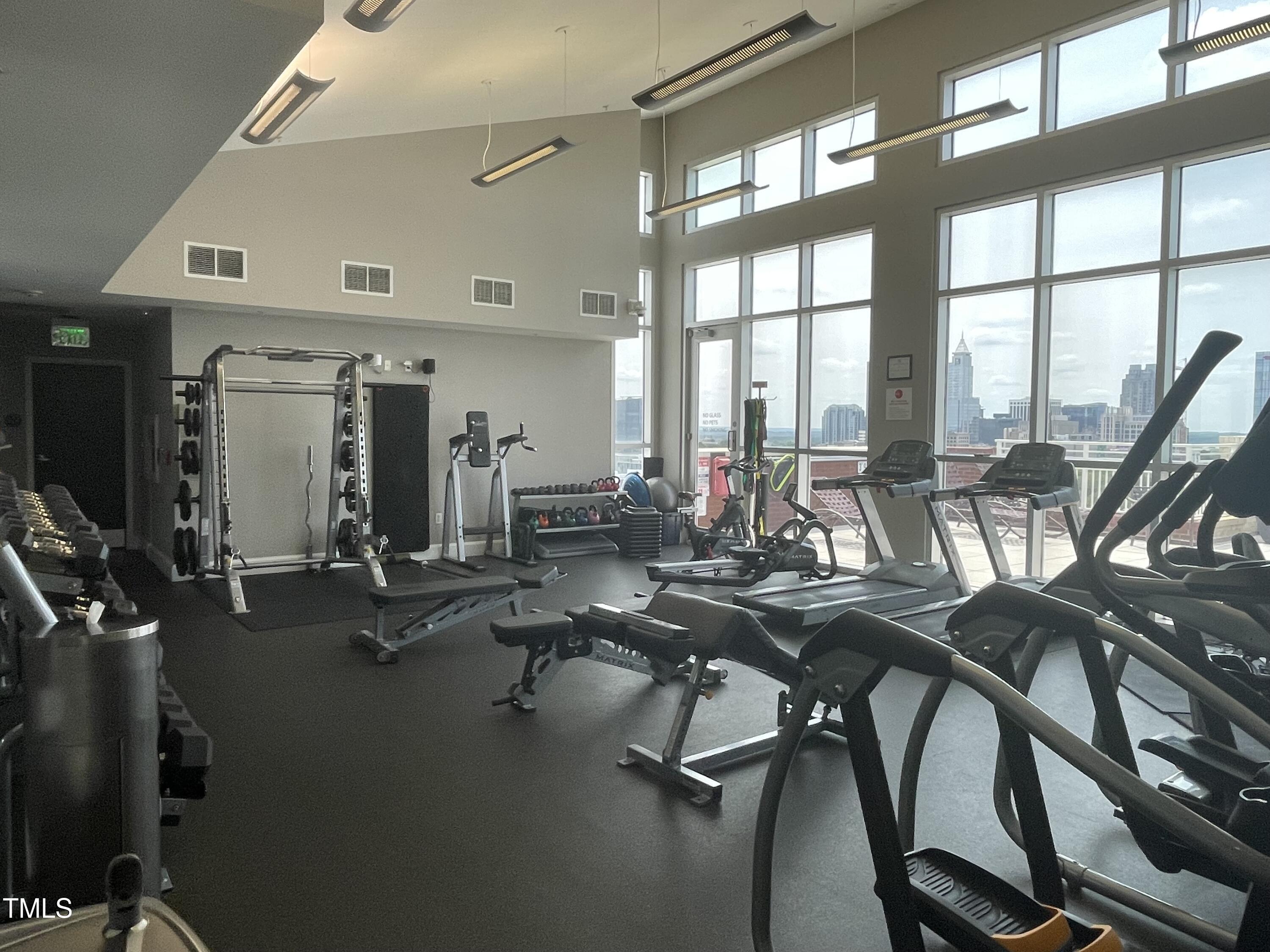 400 West North Street, Unit 604 Raleigh, NC 27603 - Photo 36 of 46 a view of a room with gym equipment