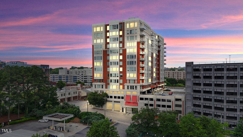 400 West North Street, Unit 604 Raleigh, NC 27603 - Photo 44 of 46 a view of a building with lot of plants and trees
