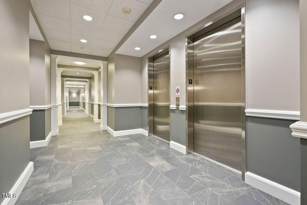 400 West North Street, Unit 604 Raleigh, NC 27603 - Photo 7 of 46 a view of livingroom with kitchen