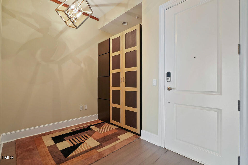 400 West North Street, Unit 604 Raleigh, NC 27603 - Photo 10 of 46 a view of an empty room with a window