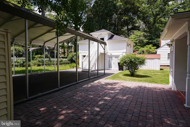 a view of backyard with green space
