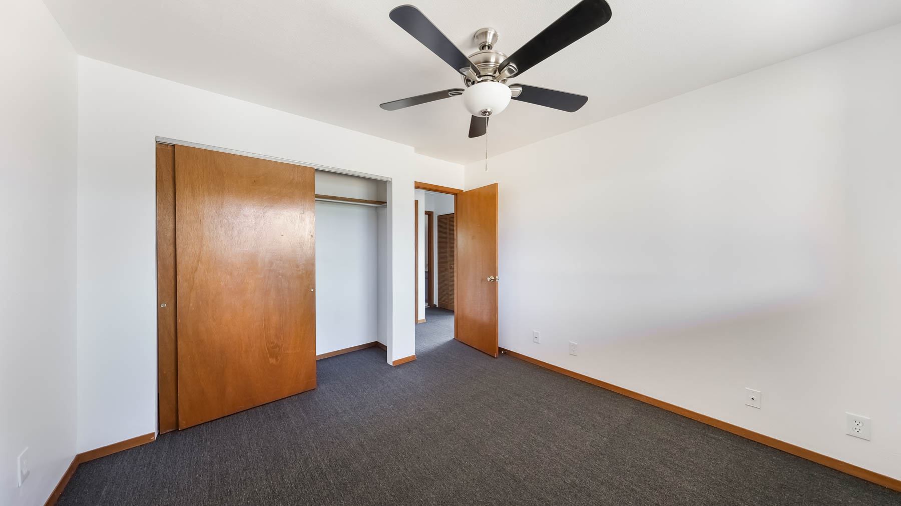 4604 Maile Road Waimea, HI 96796 - Photo 18 of 25 an empty room with a ceiling fan and a window