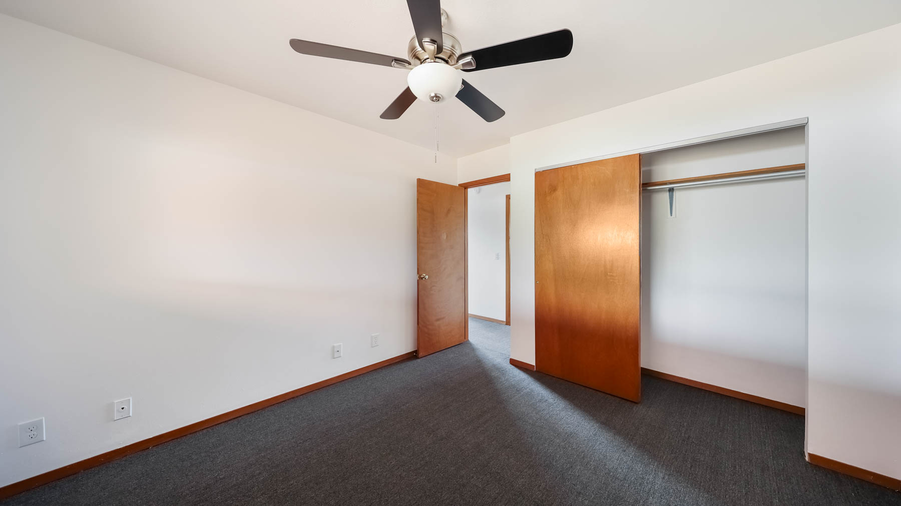 4604 Maile Road Waimea, HI 96796 - Photo 7 of 25 an empty room with windows and fan
