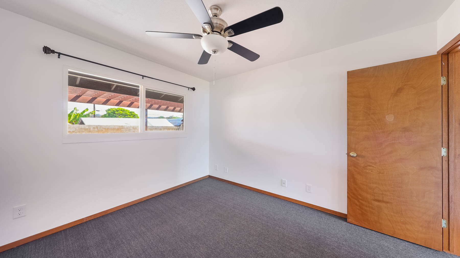 4604 Maile Road Waimea, HI 96796 - Photo 8 of 25 an empty room with windows and ceiling fan