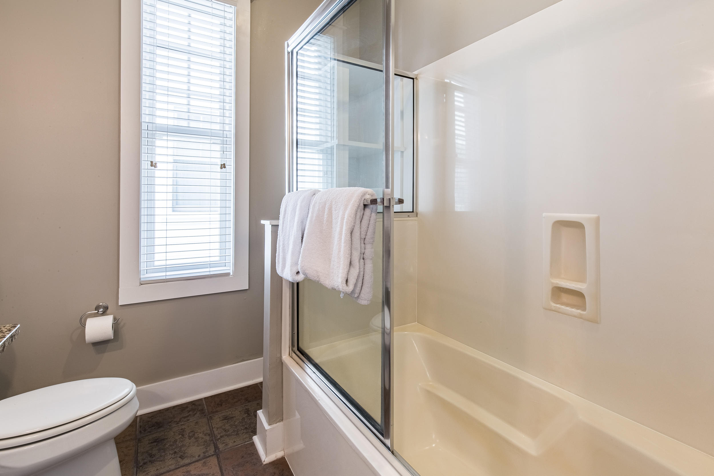 72 Chelsea Loop Road Santa Rosa Beach, FL 32459 - Photo 34 of 70 a bathroom with a granite countertop bathtub shower and toilet