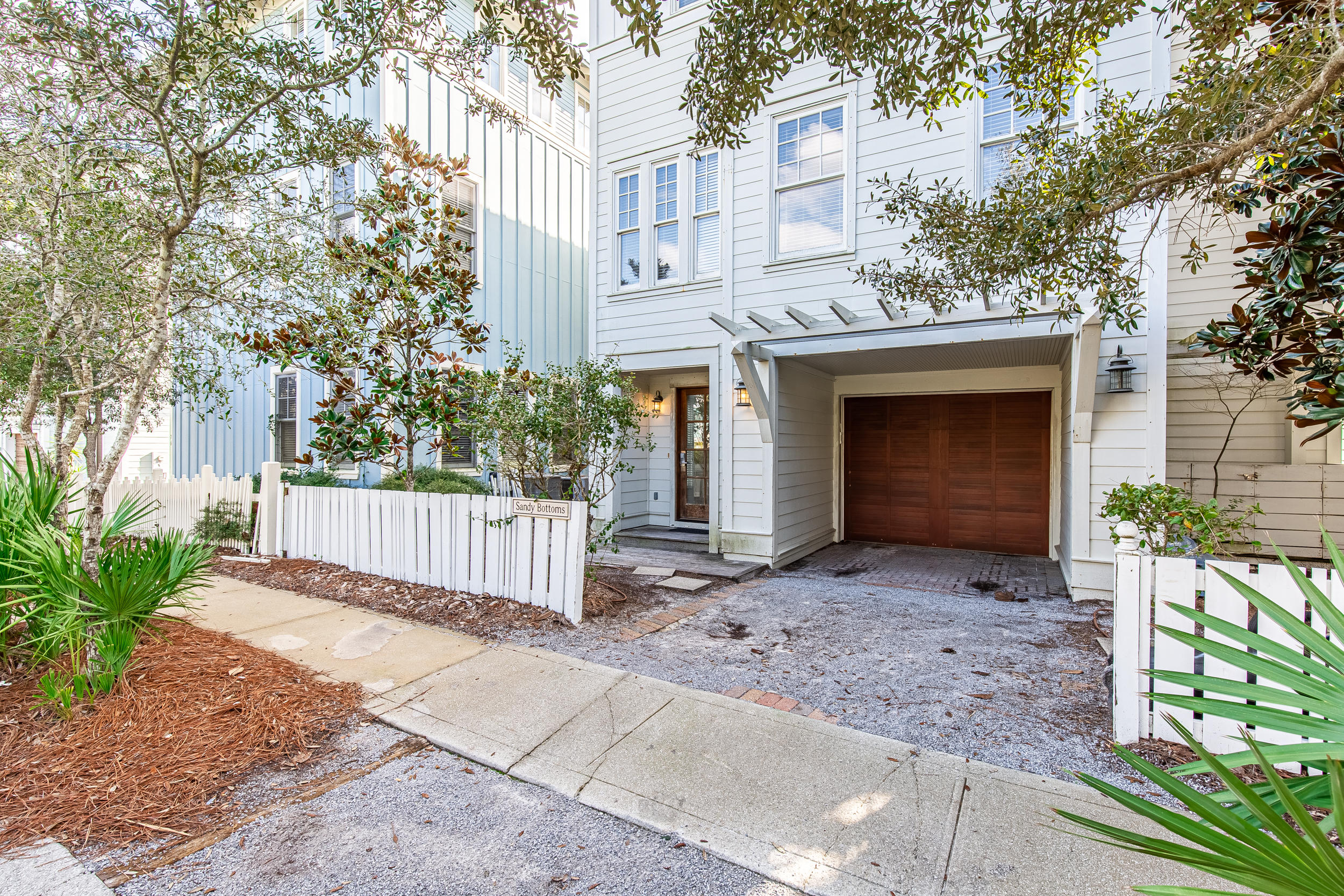 72 Chelsea Loop Road Santa Rosa Beach, FL 32459 - Photo 60 of 70 a front view of a house with a yard and garage