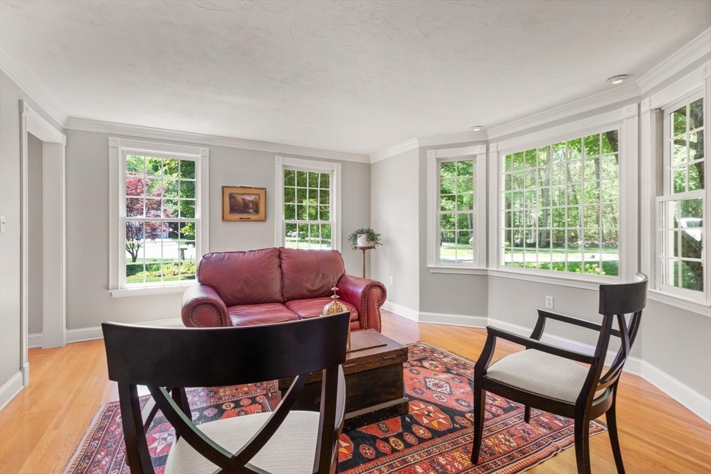 67 Bridle Path Franklin, MA 02038 - Photo 13 of 35 a living room with furniture and a window