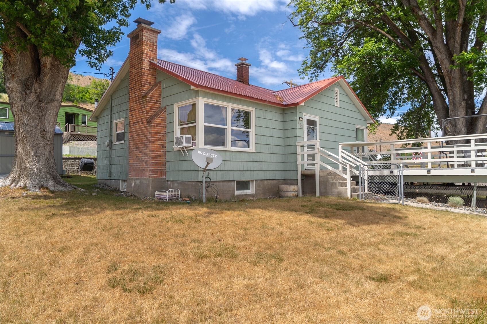 462 Beach Street Pateros, WA 98846 - Photo 30 of 30 a front view of a house with a yard
