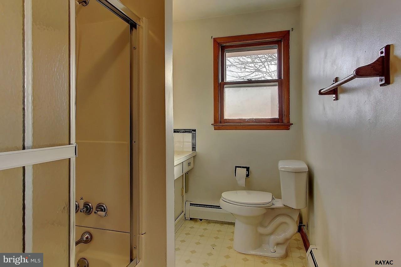 732 Terrace Road York, PA 17404 - Photo 9 of 13 a bathroom with a toilet and shower