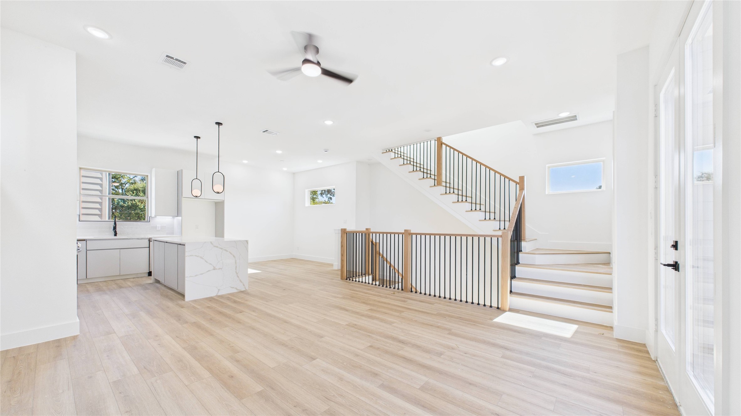 5318 Terry Street Houston, TX 77009 - Photo 8 of 28 a view of a room with wooden floor and window