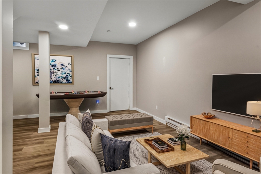 19 Delford Street Boston, MA 02131 - Photo 12 of 27 a view of a hallway with workspace