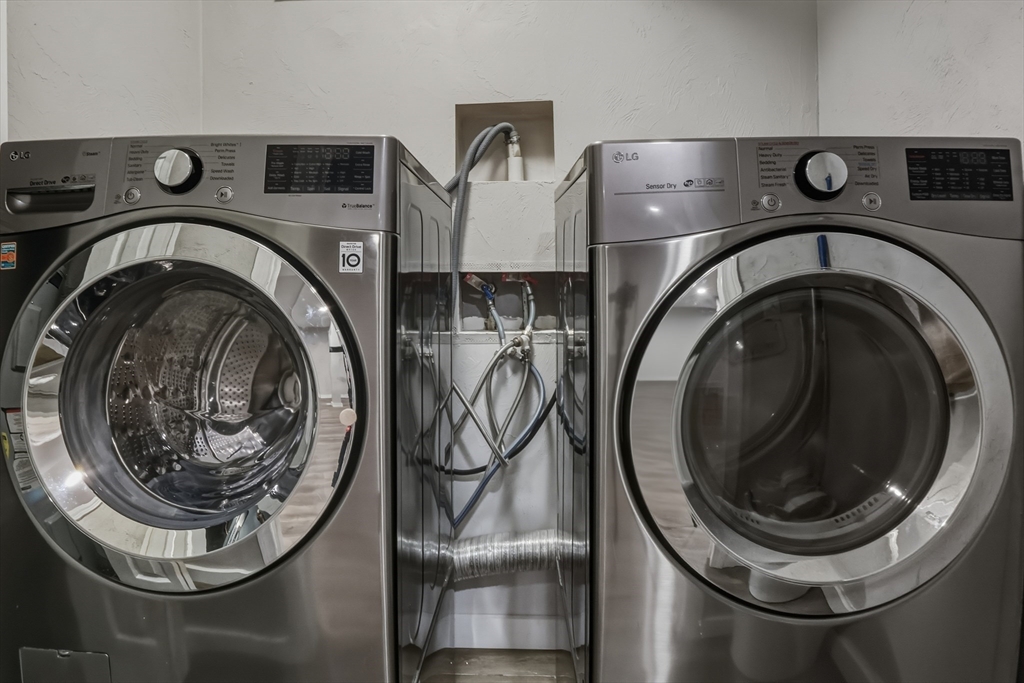 19 Delford Street Boston, MA 02131 - Photo 15 of 27 a close up view of washer and dryer