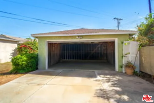 a front view of a house with a garage