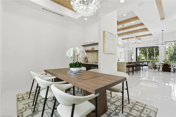 a view of a dining room with furniture